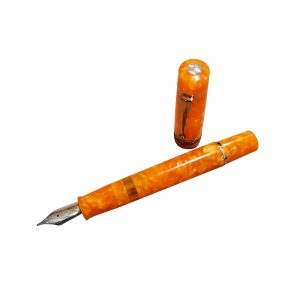 Delta Dolcevita Oro, The pen is made from a solid piece of orange resin with trimmings gold plated and solid gold nib. The main distinction between the traditional Dolcevita is the lack of a contrasting orange resin cap. Delta refers to the colour as terracotta orange, a colour common to Italy. The pens are not limited editions, but Delta records the pen's number on the cap. Min pen is number 0749. The pattern on the vermeil band around the cap references the antiquity theme of Italy. The top of the cap is crowned with a gold 'coin' imprinted in the shape of a nib with feed. The pen sports another gold band to accent the rear of the barrel at the piston cap. Screw the cap off the pen, and the beautiful broad nib, in 14K appears. The nib is one tone of gold and the single colour choice looks very good with the orange colour tone of the pen. Colour : Terracotta Orange Trim : Gold Plated Trim Body Material: Acrylic Nib Material: 14K gold Fusion Medium Nib Filling Mechanism: Piston filler Made in Italy