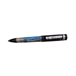 Delta Kanaka Maoli Hawaii Multicolour-Black Limited Edition Ballpoint Pen Limited to only 100 pieces worldwide the Celebration version offers its most characterizing elements, the central ring, the clip and the medal, in solid sterling silver. These elements are first plated with 24 carat gold and after enriched with a layer of pink gold further enhancing the pens spectacular details. The flowery ring features an aquamarine natural stone. The nib is in 18 carat gold and covered with pink gold. It features the traditional lateral filling system. The collection comprises also the (1K) version limited to 1898 fountain pens with the filling system accomplished by cartridge or converter and with the characterizing elements in special bronze alloy Rhodium plated. Also available are 1898 ballpoint pens (2) with twist mechanism and same characteristics as the 1k version. Body Colour : Multicolor/Black Trim : Sterling Silver Trim Body tour of the sea beautiful green beaded resin and black cap Precious rhodium-plated metal details Accent of the clip and ring Traditional kanaka maoli tribal details rendered in lost wax casting method Retractable twist ball pen The perfect gift for any occasion Limited Edition 1898 Made in Italy
