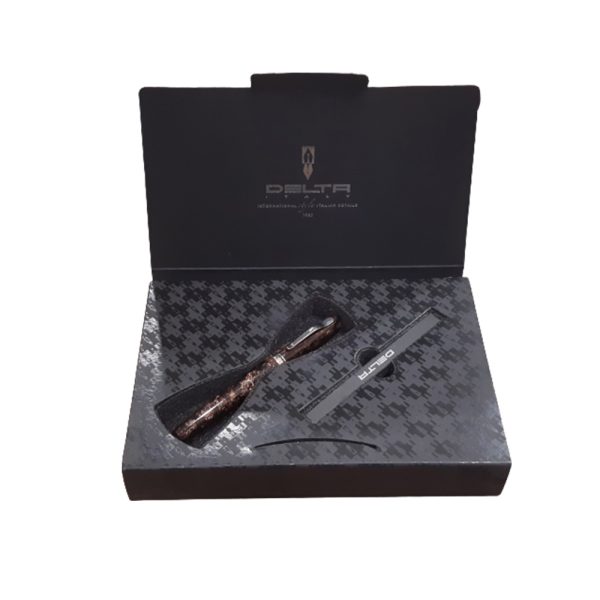The new Fusion 82 may look like the traditionally handcrafted writing instruments from Delta – but it is so much more! The fountain pen holds the patent-pending Fusion nib – a revolution in design by Delta. The nib was developed to improve the efficiency of the fountain pen by enhancing the physical-chemical properties of ink within its assembly system. The foundation of the Fusion nib is a steel alloy covered and decorated with a layer of precious 18K gold: the ink is made more viscous on the tip of the nib because the thermal conductivity of the precious metal plate will heat the underlying steel – the higher temperature makes the ink flow more smoothly. The combination of gold and steel on the flexible nib gives it a unique and appealing look. It is strong and durable for long writing sessions – much more so than solid gold nibs. Hence, the fountain pen is more precious and at the same time less expensive! Fusion 82 is one of the collections chosen to launch Delta’s new and innovative nib. The writing instruments are turned by hand from solid bars of special resin and polished to a mirror finish in three colors: blue and brown marble and solid black. Colour – Marbled Brown Nib : Medium 18kt Fusion nib Brown Resin with Rhodium trim Fill Mechanism: Cartridge & Converter Pen come with Delta Gift Box Made in Italy 