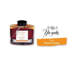 Pilot Iroshizuku 50ml Ink Bottle - Yu-Yake, Sunset (Burnt Orange) The name Iroshizuku is a combination of the Japanese words Iro (Coloring), expressing high standards and variation of colors, and Shizuku (Droplet), that embodies the very image of dripping water. Each ink name derives from the expressions of beautiful Japanese natural landscapes and plants, all of which contribute to the depth of each individual hue. yu-yake Sunset (Burnt Orange) This shade of orange conjures up sky, painted by the evening sunset on clear day. Colour : Burnt Orange Ink Colour : Sunset (Yu-Yake) Created using the highest standards and variations of color Ink names derived from Japanese natural landscapes and plants Enjoy the intense and subtle colors of Japan as you write Works well with Pilot and Namiki fountain pens Each 50 ml bottled ink is made from hand blown glass Angled etched bottle bottom allows pen to use virtually every drop of ink Made in Japan