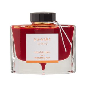 Pilot Iroshizuku 50ml Ink Bottle - Yu-Yake, Sunset (Burnt Orange) The name Iroshizuku is a combination of the Japanese words Iro (Coloring), expressing high standards and variation of colors, and Shizuku (Droplet), that embodies the very image of dripping water. Each ink name derives from the expressions of beautiful Japanese natural landscapes and plants, all of which contribute to the depth of each individual hue. yu-yake Sunset (Burnt Orange) This shade of orange conjures up sky, painted by the evening sunset on clear day. Colour : Burnt Orange Ink Colour : Sunset (Yu-Yake) Created using the highest standards and variations of color Ink names derived from Japanese natural landscapes and plants Enjoy the intense and subtle colors of Japan as you write Works well with Pilot and Namiki fountain pens Each 50 ml bottled ink is made from hand blown glass Angled etched bottle bottom allows pen to use virtually every drop of ink Made in Japan