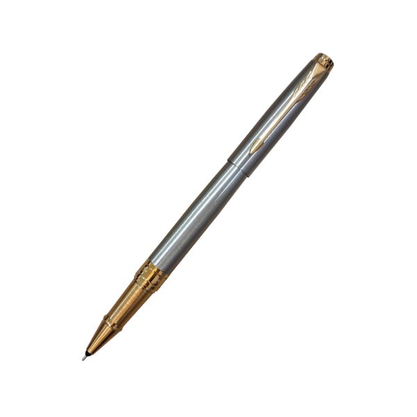 Parker Aster Brushed Metal Gold Trim Rollerball Pen, Parker Aster Roller Ball Pen With Brushed Metal Finish Brushed Metal Barrel And Gold Plated Trim. A Contemporary & Unique Design Blended Highlighted With A Gold Plated Ring On The Barrel. Body Colour : Brushed Metal Gold Plated trim for premium look Cap on/off A contemporary and unique design blended highlighted with a gold plated ring on the barrel Country of Origin: India