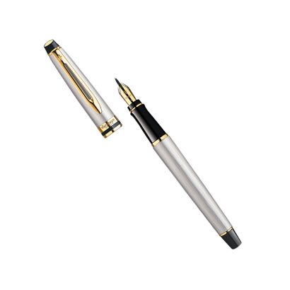 A Contemporary Pen That Distinguishes Itself By A Bold, Rounded ‘Cigar’ Shape, Expert Is An Object Of Refined Confidence. Precise, Demanding And Efficient, Its Individual Design Exudes Masculinity, Dynamism And Strength. Expert Is The Ultimate Expression Of Creative Expertise. The Stainless Steel Surface Combines With Cool, Bright Gold-Plated Trims To Create A Powerful And Pure Contemporary Character. The Original Slanted Cap Button With An Aluminum Medal Strengthens The Stylish Cosmopolitan Personality Of Expert. Engraved With The Waterman Hexagon And Signature W, This Elegant Stainless Steel Nib Ensures Optimal Writing Comfort. Finish – Brushed steel, golden trims… the alchemist’s art allies these metals to create an accessory both contemporary and sophisticated. Trims metal – 23K gold plated Material – Stainless steel satin Clip – Golden with 23K Gold Cap on-off mechanism Nib  – Stainless Steel 23K gold plate 2-tone finish Medium Nib 1 Blue Ink Cartridge (Blue) in gift box Made in India