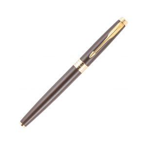 Parker Aster Fountain Pen With Matt Brown Finish Metal Barrel And Gold Plated Trim. A Contemporary & Unique Design Blended Highlighted With A Gold Plated Ring On The Barrel. Body : Matte Brown with Gold-plated Trim Pen opening mechanism: Cap off/ cap on Stainless Steel Medium Nib A contemporary and unique design blended highlighted with a gold plated ring on the barrel Country of Origin: India