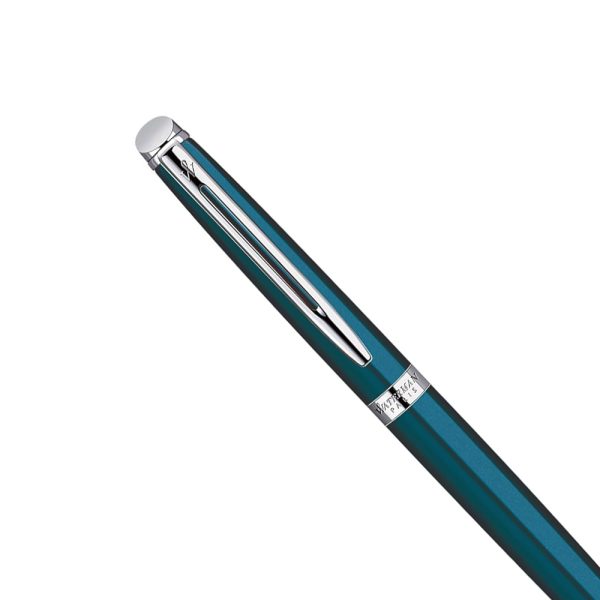 The Waterman Hemisphere Metallic Blue CT Ballpoint Pen is a writing instrument produced by Waterman, a well-known Indian pen manufacturer. Transform your signature style with the wonderfully timeless Waterman Hémisphère Ballpoint Pen. The pen has a sleek and sophisticated design, with a metallic blue barrel and Palladium-plated trim, giving it an elegant and modern appearance. Light in the hand yet exquisitely designed with beautiful finishes and fashionable patterns, this premium ballpoint pen provides the perfect balance of light, effortless writing and confidently Parisian style. The Waterman Hemisphere Ballpoint Pen is a presented in a premium Waterman gift box, ideal for celebrating graduations, promotions and new jobs. Lacquer coated blue glossy body Sleek palladium plated trim with twist mechanism Body Material: Brass Compatible Refill: Proprietory Refill Blue Refill has a medium nib with smooth-writing. Ballpoint pen is used with a Waterman refill Country of Origin: India Ballpoint pen is presented in a beautiful waterman gift box. Colour may change as per image of pen  