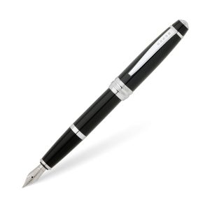 A simple articulation of modern Cross design, this elegant writing instrument features a traditional well-balanced profile in a selection of sophisticated finishes. A multi-grooved center ring with deep-cut engraved accents adds just the right amount of flair. A black lacquer finish with chrome appointments & Click-off cap Stainless steel fountain pen nib in medium or fine width options Specially formulated ink flows flawlessly and dries quickly Includes two black fountain pen cartridges (refill #8921). Optional converter available (#8756) to fill pen from bottled ink Country of Origin : Hong Kong