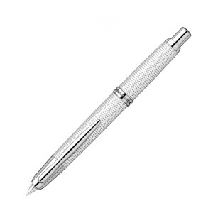 Pilot Capless Kasuri White Rhodium Trim Fountain Pen a.k.a Carbonesque in Europe due to the similarity of a carbon-fibre finished. This finish is actually known as the Kasuri in Japan. Kasuri is a Japanese word for fabric that has been woven with fibers dyed specifically to create patterns and images in the fabric. It is an ikat (resist-dyeing) technique. The patterns are characterized by a blurred or brushed appearance which is reflected in this pen. Body Colour: Kasuri White Series: Capless Kasuri (kasuri) Product Number : 2085 - 1500RRR-M-W Material : Metal Trim : Rhodium Cap Type : Capless Nib : 18Kt rhodium-plated gold Medium Nib Converter Included : Yes Method - Knock type Fill Mechanism : Cartridge/Converter (CON-40 *Cartridge ink can also be used.) Packaging Type : Gift Box Packaging Made in Japan