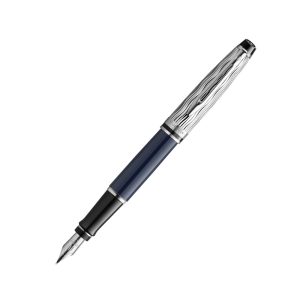The Waterman Expert L'Essence Du Bleu CT Fountain Pen is a high-quality fountain pen made by the Waterman company, a well-known brand in the world of fine writing instruments. The L’Essence du Bleu Expert fountain pen is finished in a vibrant, deep blue lacquer with Waterman’s signature wave pattern chiselled into the metal cap. The stainless steel fountain pen nib features the looped W Waterman design. Each luxury pen is crafted in France and presented in a premium Waterman gift box. Overall, the Waterman Expert L'Essence Du Bleu CT Fountain Pen is a stylish and reliable writing instrument, ideal for those who appreciate the elegance and tradition of fountain pens. Lacquer coated Brass barrel with a signatuer wavepattern on the cap Palladium plated cap and trim Body Material: Brass It uses standard size converter or cartridges Engraved Stainless steel nib - Fine  Fountain pen is presented in a beautiful waterman gift box. Made in India